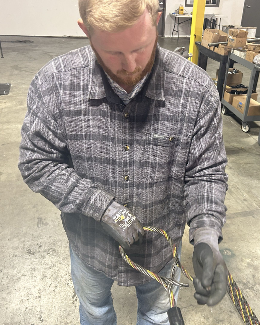 Jay Ashley fabricating a wire rope sling at J.A. Lifting Products